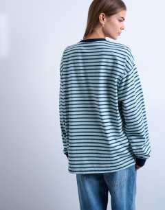 Model wearing Stripe long sleeve slouchy skater tee in blue