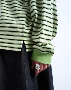 Model wearing Stripe long sleeve slouchy skater tee in green