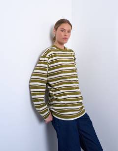 Model wearing Stripe long sleeve slouchy skater tee in khaki 