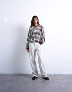Model wearing Stripe long sleeve slouchy skater tee in mint and burgundy