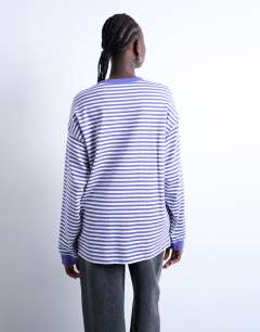 Model wearing Stripe long sleeve slouchy skater tee in purple