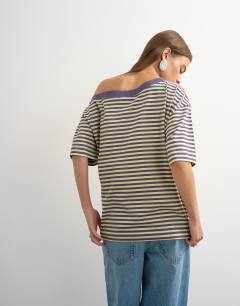 Model wearing Stripe off shoulder t-shirt in navy