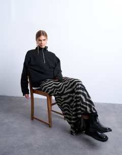 Model wearing Stripe print mesh maxi skirt in multi