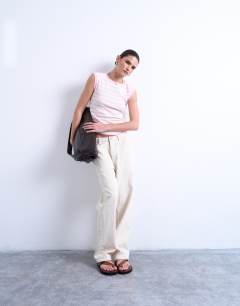 Model wearing Stripe rib boyfriend tank in pink