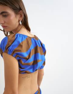 Model wearing Stripe ruched back cut out top in brown