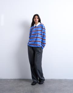 Model wearing Stripe rugby long sleeve polo top in blue