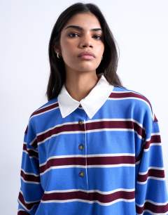 Model wearing Stripe rugby long sleeve polo top in blue