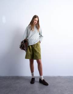 Model wearing Stripe skater tee in ecru