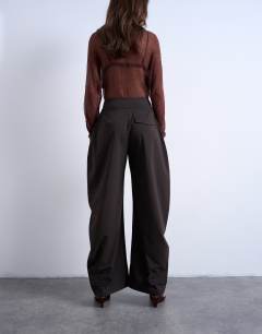 Model wearing Stripe tailored barrel leg trouser
