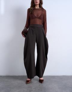 Model wearing Stripe tailored barrel leg trouser