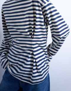 Model wearing Stripe tuck waist tee in blue & white