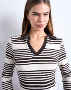 Model wearing Stripe v-neck polo long sleeve top in chocolate and ecru