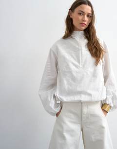 Stripe zip long sleeve cuffed top in white