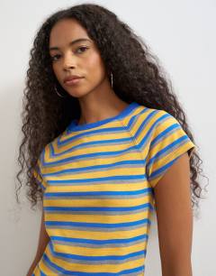 Model wearing Striped baby tee in yellow