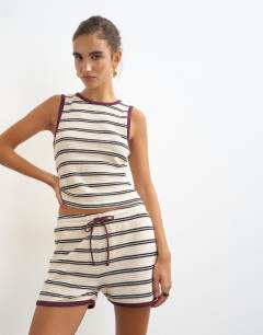 Model wearing Striped co-ord short in cream
