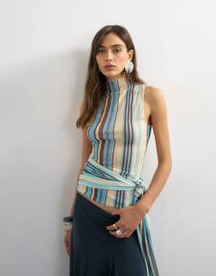 Model wearing Striped high neck sleeveless tank in blue