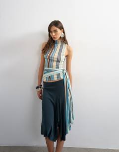 Model wearing Striped high neck sleeveless tank in blue