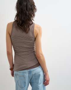 Model wearing Striped tank in chocolate