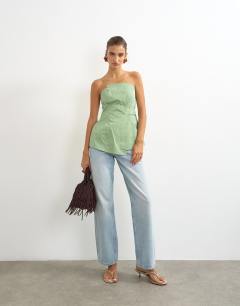 Model wearing Structured asymmetric bandeau in green