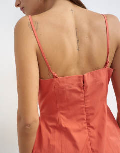 Model wearing Structured cami in rust