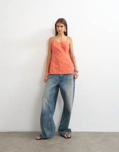Model wearing Structured cami in rust