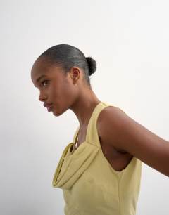 Model wearing Structured drape mini dress in soft lime