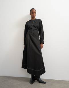 Model wearing Structured midi dress with tie waist detail and batwing sleeve