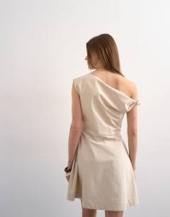 Model wearing Structured mini dress with twist shoulder in off white