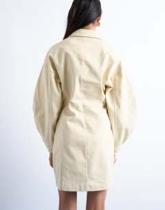 Model wearing Structured rugby collar mini dress in beige