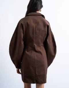 Model wearing Structured rugby collar mini dress in chocolate