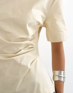 Model wearing Structured short sleeve ruched side top in stone