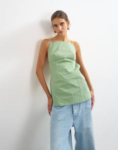 Model wearing Structured strappy back longline top in sage