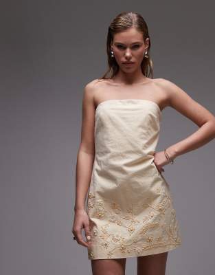 Topshop - Strukturiertes, trägerloses Kleid in Buttermilchgelb mit Bast-Stickerei