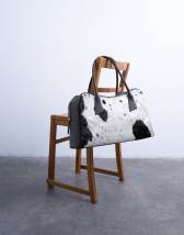 Topshop Suki real leather shoulder bowler bag in cow print pony