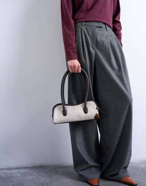 Topshop Sullivan real leather bowler shoulder bag in cow print pony