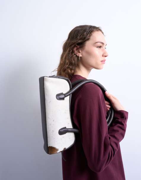 Topshop – Sullivan – Torebka bowler na ramię z naturalnej skóry we wzór w krowie łaty - view 1