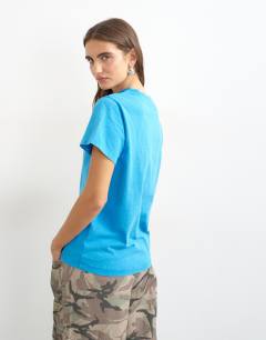 Model wearing Topshop 'Sun Club' graphic oversized t-shirt in cream