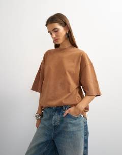 Model wearing Topshop 'Sundream' graphic embroidered detail oversized t-shirt in brown