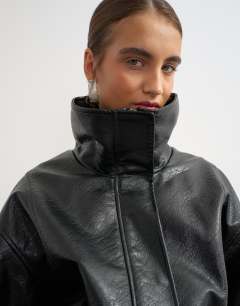 Model wearing Super oversized faux leather cinch waist funnel neck jacket in black