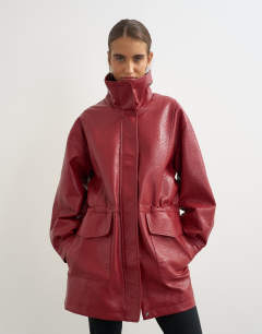 Model wearing Super oversized faux leather cinch waist funnel neck jacket in cherry
