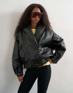Model wearing Super oversized faux leather shawl collar bomber jacket in black