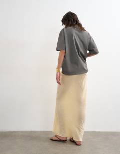 Model wearing Super soft cupro bias midi in buttermilk