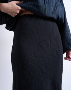 Model wearing Super soft cupro bias midi skirt in charcoal