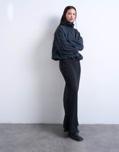 Model wearing Super soft cupro bias midi skirt in charcoal