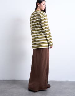 Model wearing Super soft cupro bias midi skirt in chocolate