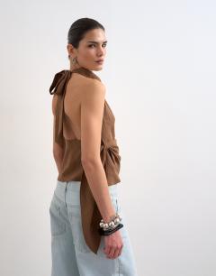 Model wearing Super soft cupro halter neck in chocolate