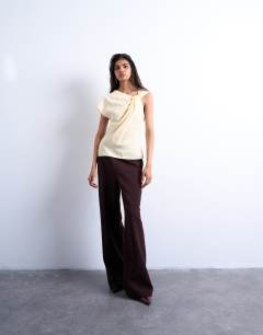 Model wearing Super soft cupro knot detail top in buttermilk