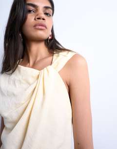 Model wearing Super soft cupro knot detail top in buttermilk