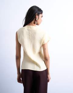 Model wearing Super soft cupro knot detail top in buttermilk