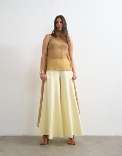 Model wearing Super wide leg  A line trouser in ecru